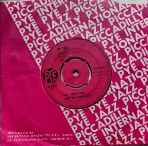 The seven-inch record for "Dr. Who" by Eric Winstone and His Orchestra, in a pink sleeve.